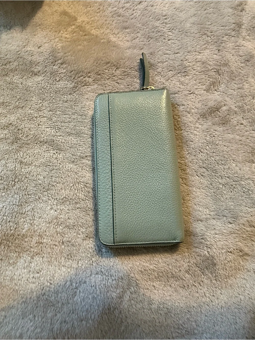 kate spade light blue pebbled leather zip-around wallet